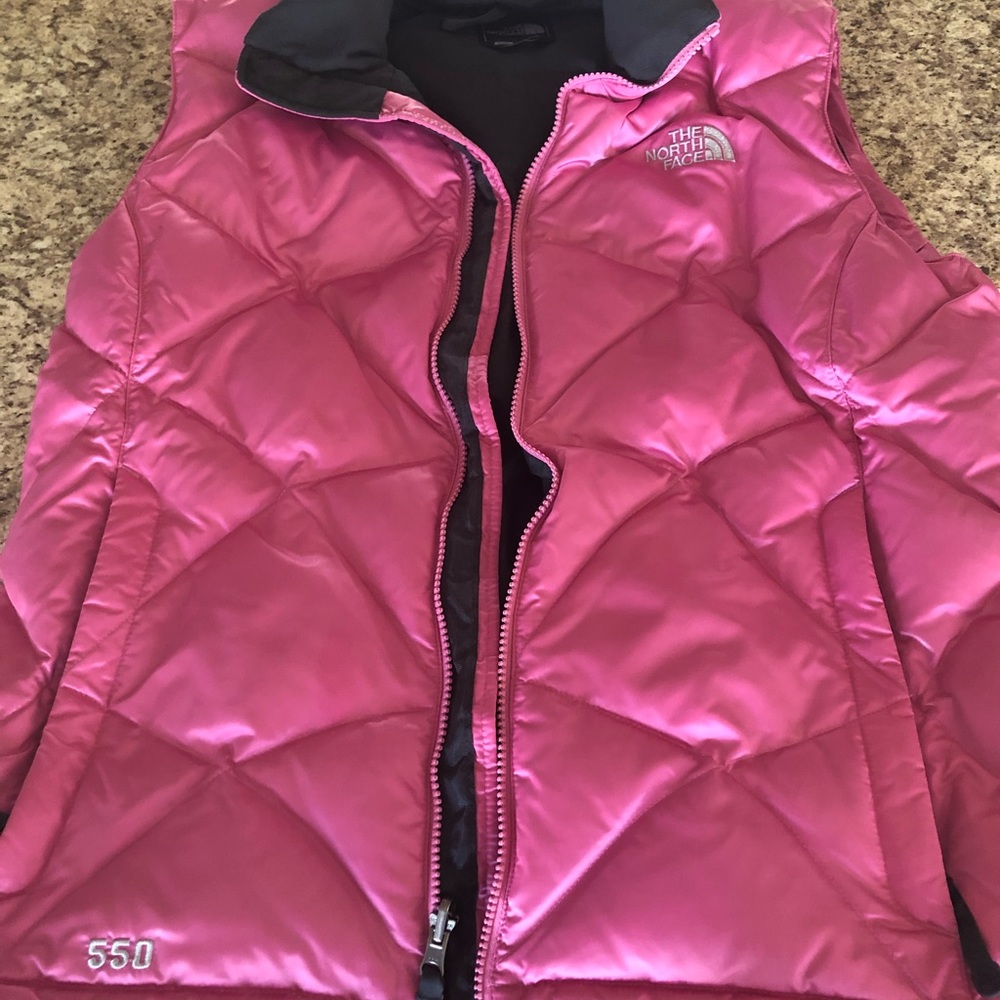 Pink women’s large North Face vest